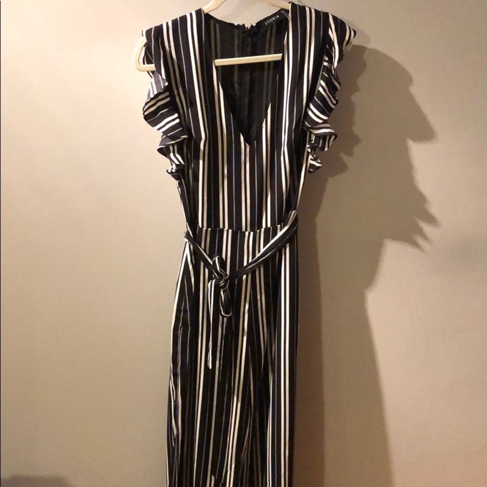 A black and white striped jumpsuit